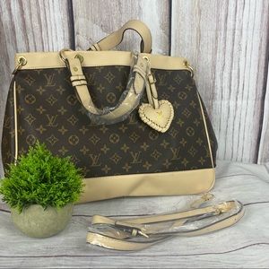 inspired tote brown. Reposhing, just too much purse for me.